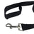 Long nylon dog training lead in red coiled on grass
