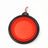 Collapsible silicone travel dog bowl in red folded flat