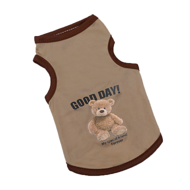 Small dog wearing a light blue striped summer vest