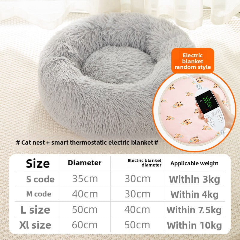 Cat sleeping in a round electric warming bed in winter
