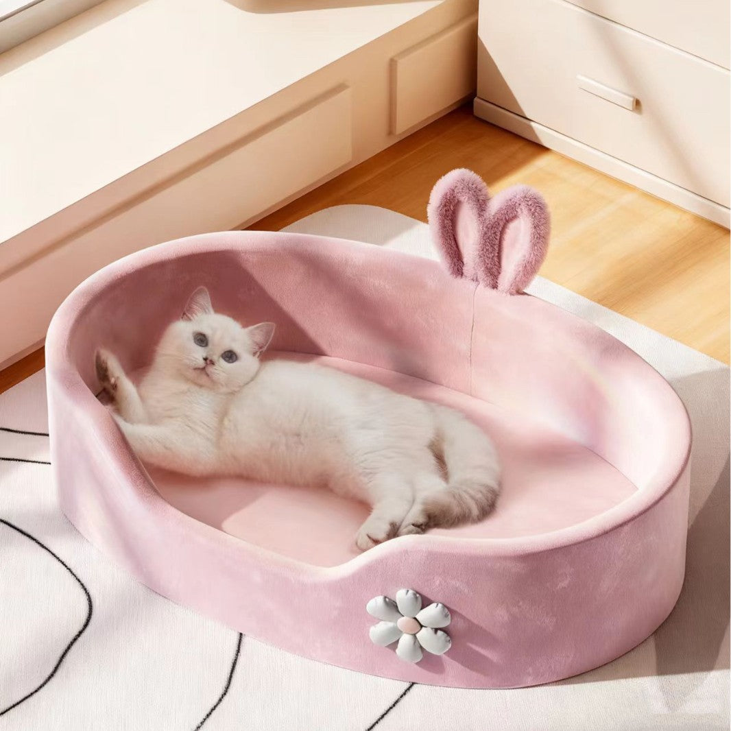 Pink soft sponge pet bed with raised edge, view 2
