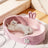 Pink soft sponge pet bed with raised edge, view 2