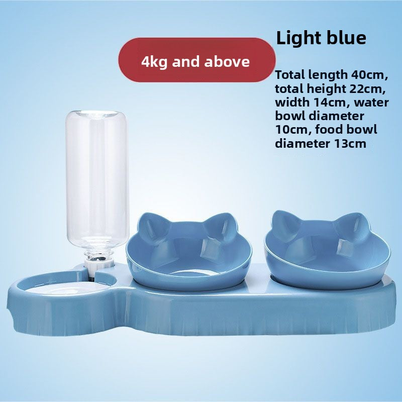 Cat eating from a light blue anti-tip double bowl
