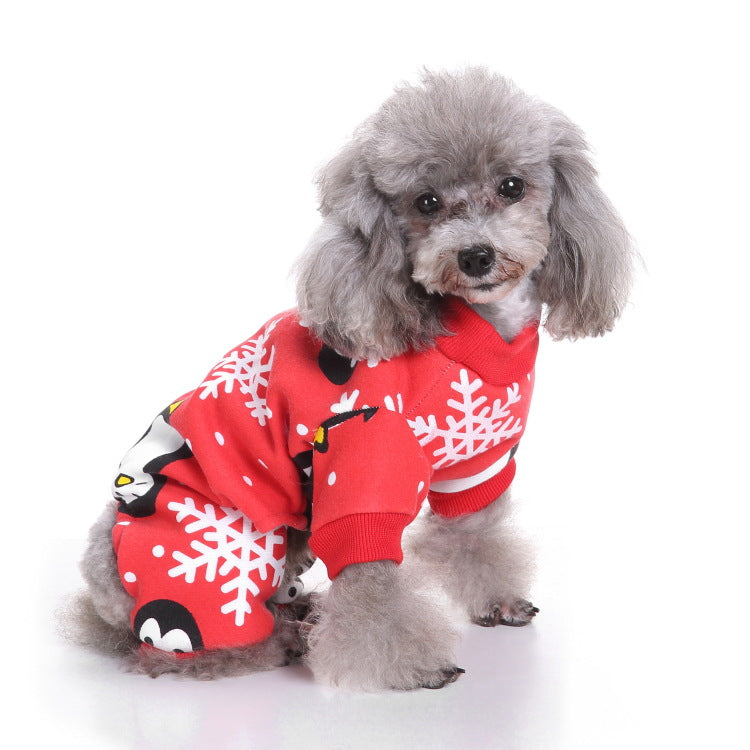 Small dog wearing a warm Christmas elk costume