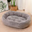 Green oval dog bed in 70 by 55cm size