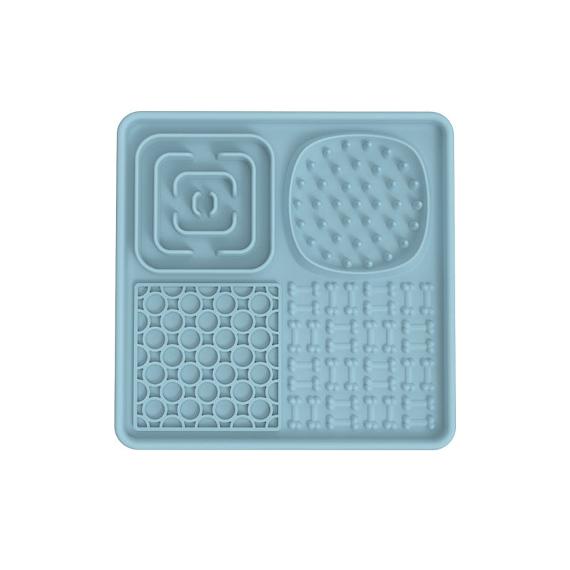Dog licking a rectangular silicone slow feeder mat
