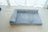 Blue plush cat bed in medium size with soft cover
