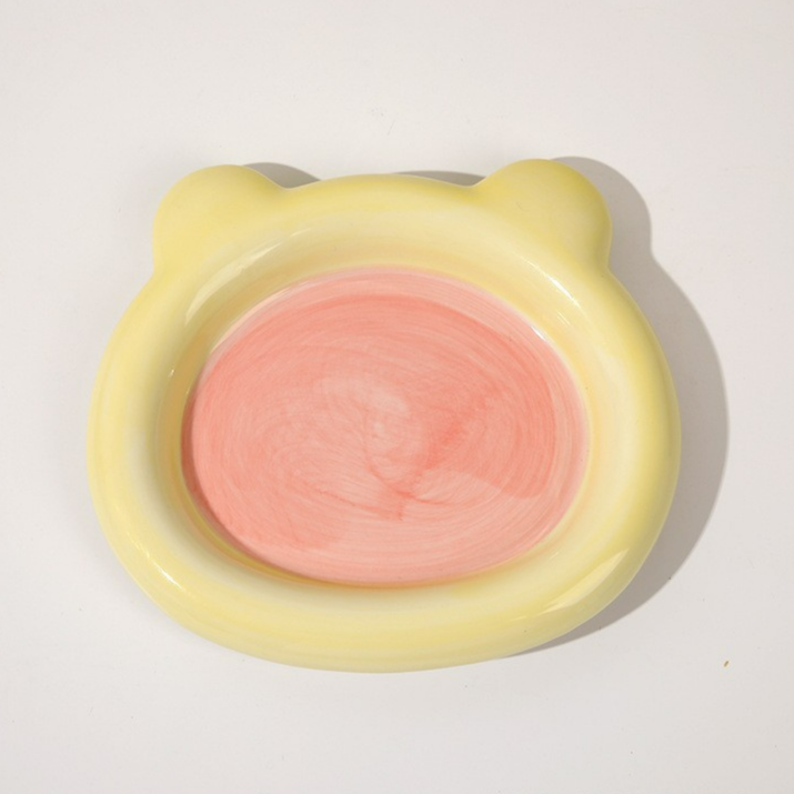 Glazed ceramic pet food plate with bear design in blue and pink, view 5