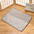 Cooling nylon pet mat for dogs and cats in Light Grey, in a home setting