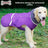 Water-resistant padded dog winter coat with reflective trim in Red, side view