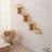 Wooden wall-mounted cat perch with hammock, close-up detail view