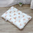 Cat sleeping on a pink rabbit coral fleece blanket