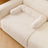 Light grey machine washable pet mat on a sofa