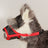 Breathable mesh dog muzzle in orange with padded lining