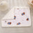 Cat curled up on a planet cat print pet blanket