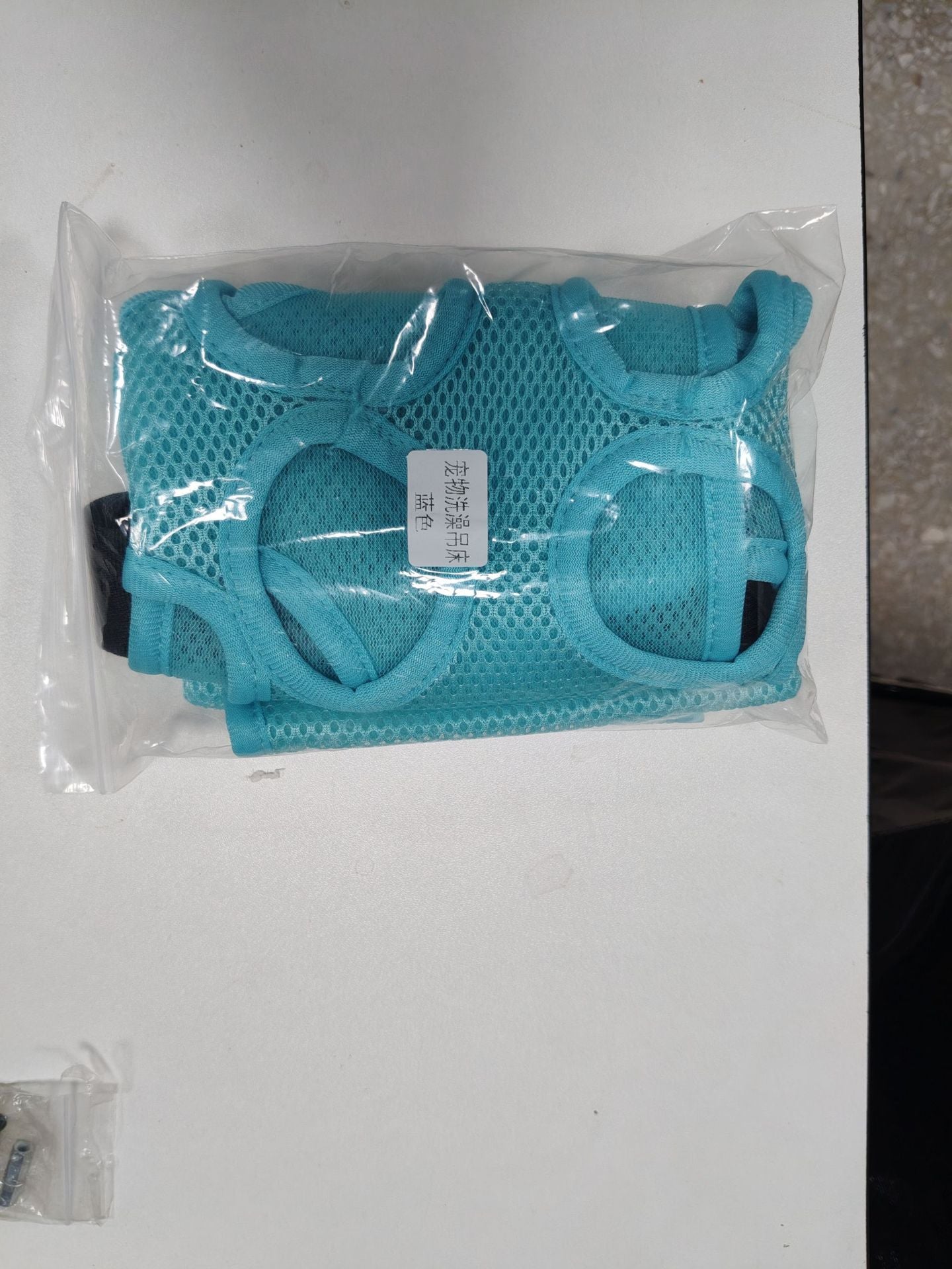 Pet grooming hammock with stand holding a small dog for nail trimming, photo 11