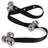 Puppy nudging stainless steel bells hanging on a door