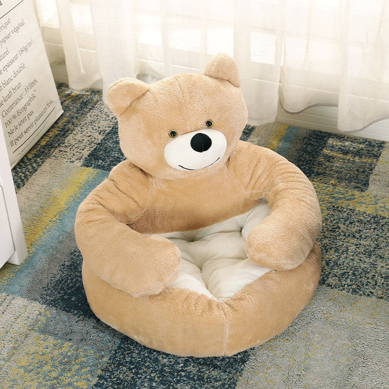 Cat curled up in a brown padded pet nest