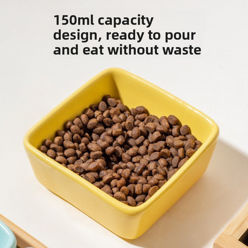 Square ceramic pet dishes on a raised bamboo feeding tray, view 4