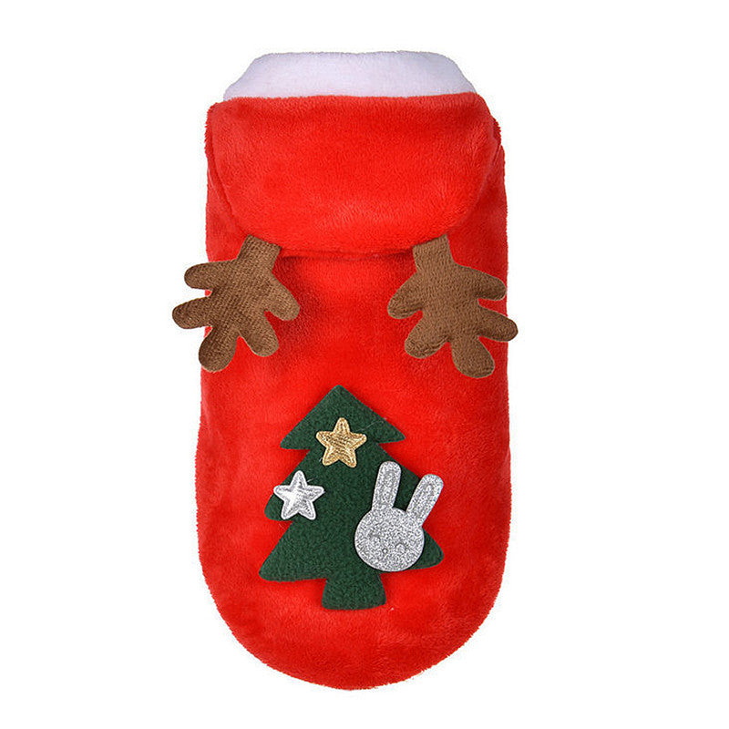 Christmas coral fleece dog outfit with reindeer design in Red, in a home setting