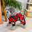 Small dog in a red camo four leg reflective coat