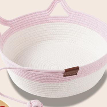 Rattan woven cat nest with ball toy and cream pad, view 3