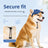Adjustable pet baseball cap with ear cutouts in White Cow Print, in a home setting