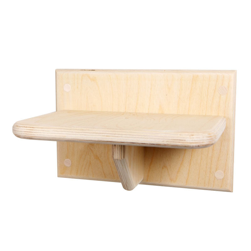 Wooden cat perch fixed to a living room wall