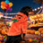 Cat wearing a pumpkin ghost Halloween costume with plaid detail