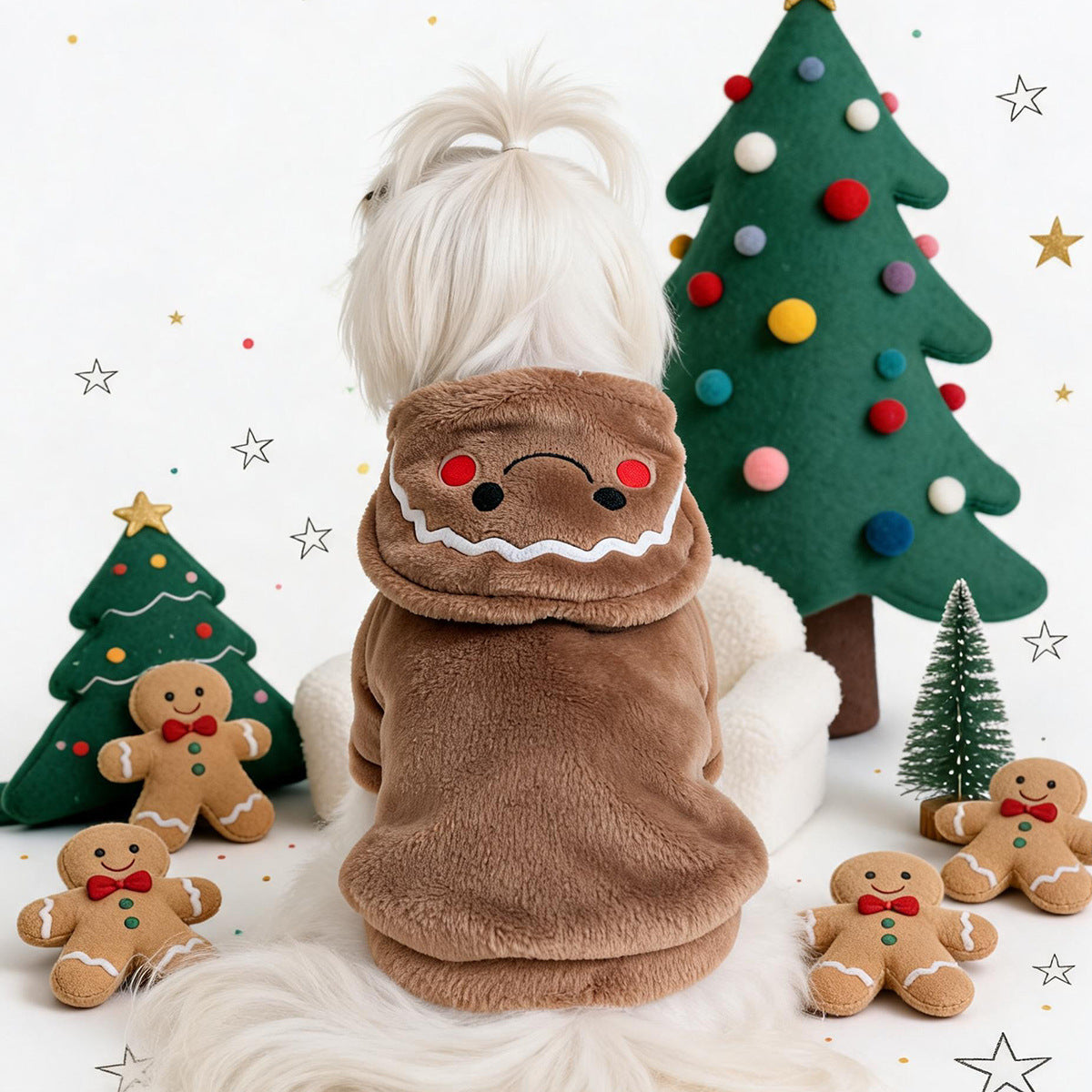 Small dog dressed in a plush gingerbread man costume