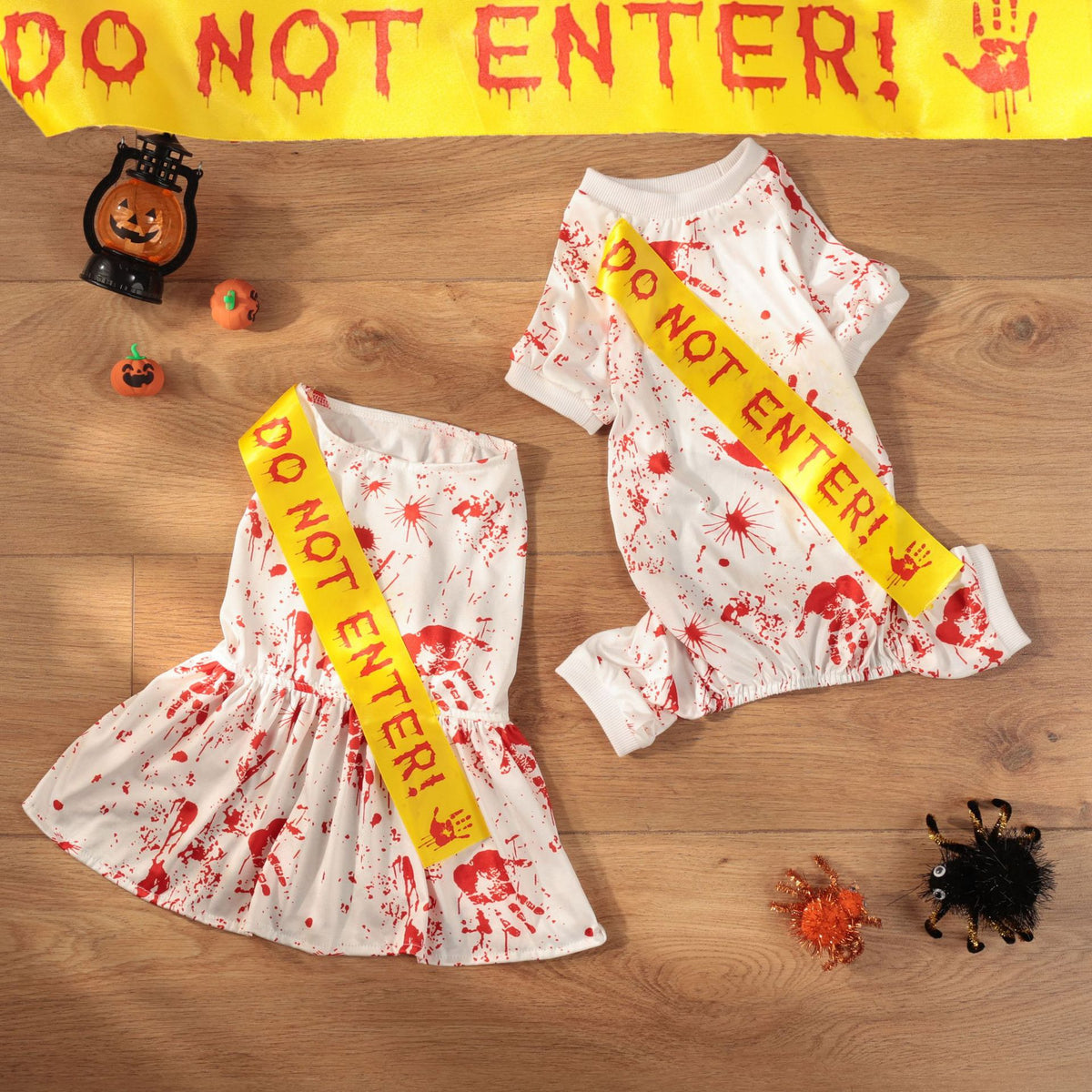 Small dog wearing a blood splatter print Halloween costume
