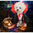 Small dog dressed in a funny alien Halloween costume