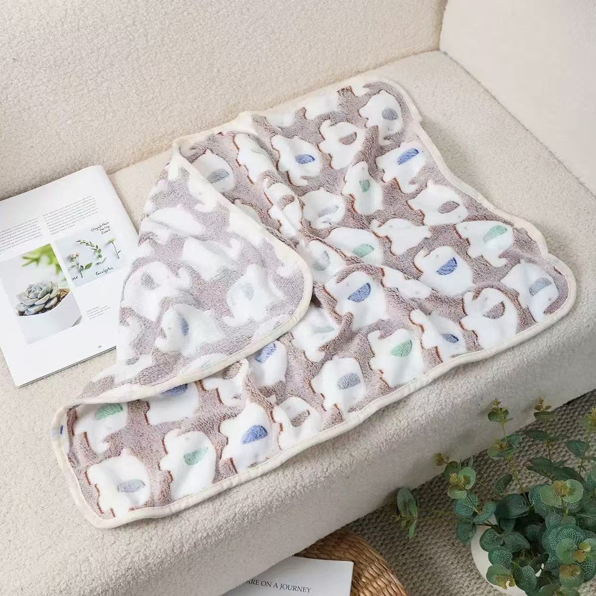 Soft warm fleece blanket for small pets, close-up detail view