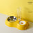 Gravity pet feeder and water bottle station with stainless steel bowl, view 9