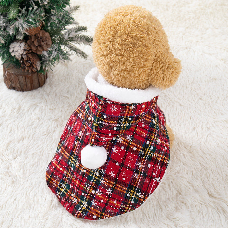 Cat wearing a red Christmas plaid hooded cape