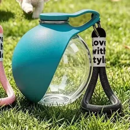 Silicone dog travel water bottle with ball outlet in Pink, material detail