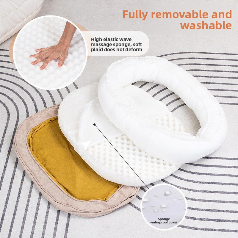 Removable washable donut dog bed, close-up detail view