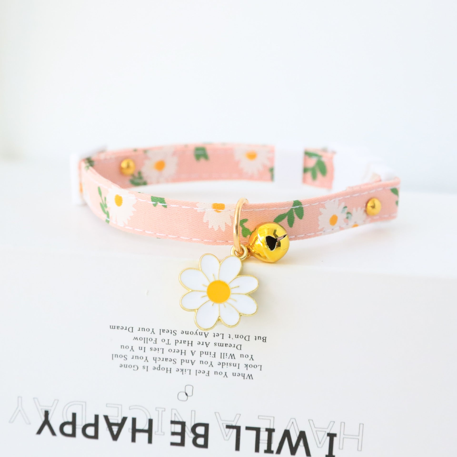 Floral cat collar with bell and safety buckle in Purple, close-up detail