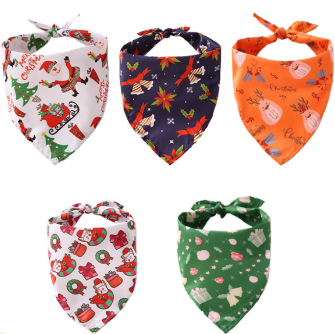 Small dog wearing a pretty floral print triangle pet bandana