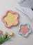 Shallow ceramic pet food plate with cute bear design in blue and pink, view 3