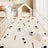 Waterproof PVC dog crate mat in Spotted Cow Dog, size 40 x 60cm