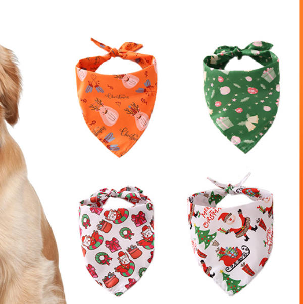Small dog wearing a pretty floral print triangle pet bandana
