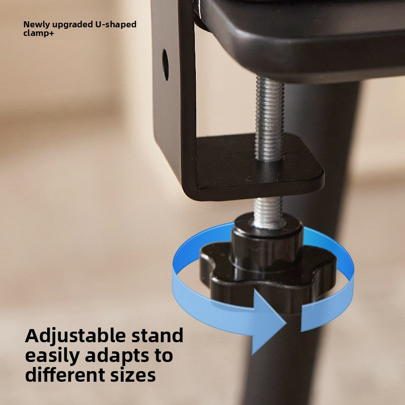Cat resting on a height adjustable desktop climbing frame