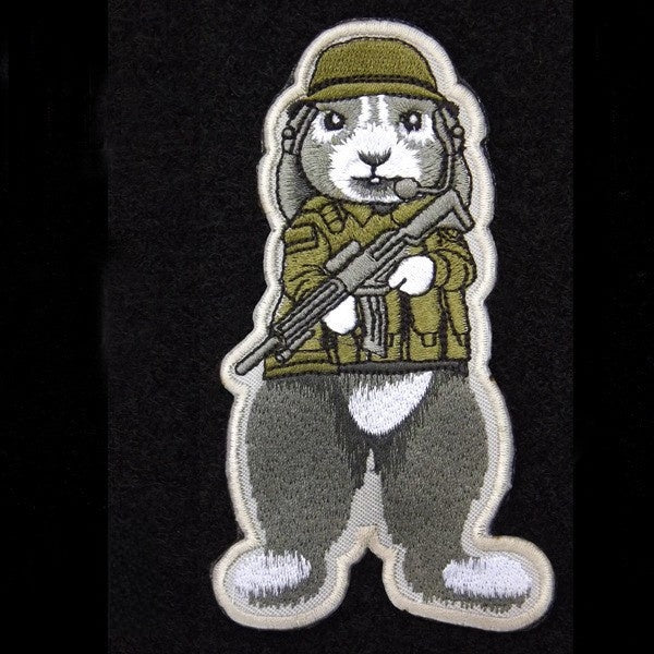 Reflective hooded dog raincoat in silver fabric, showing size and shape