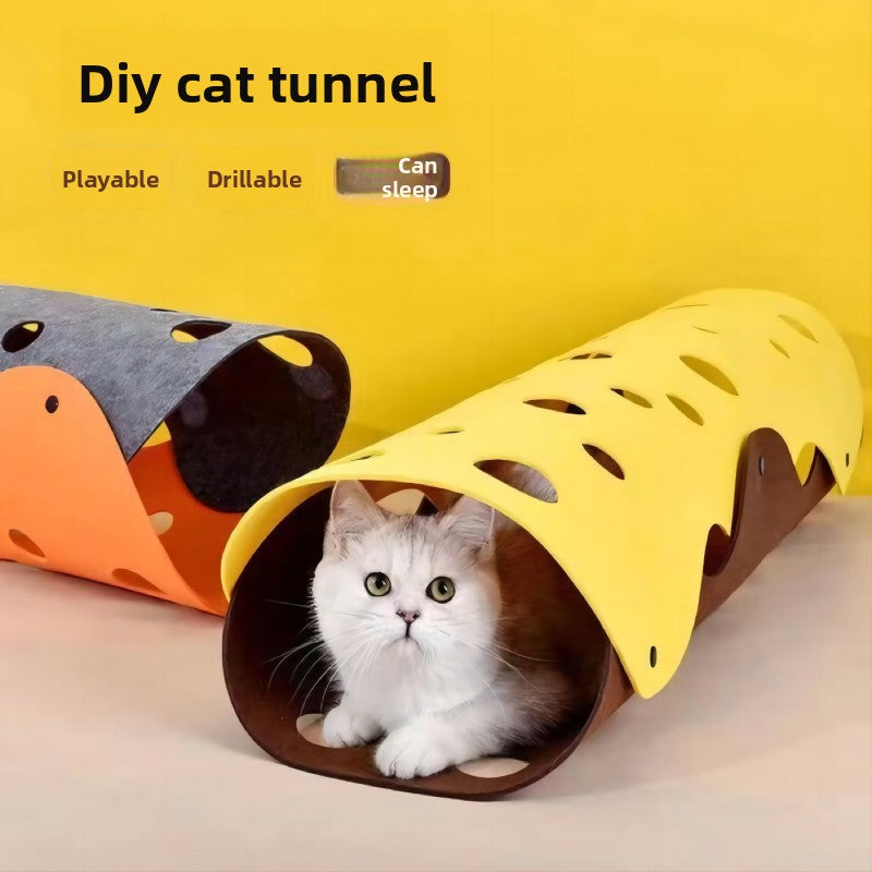 Cat exploring an orange and grey felt play tunnel
