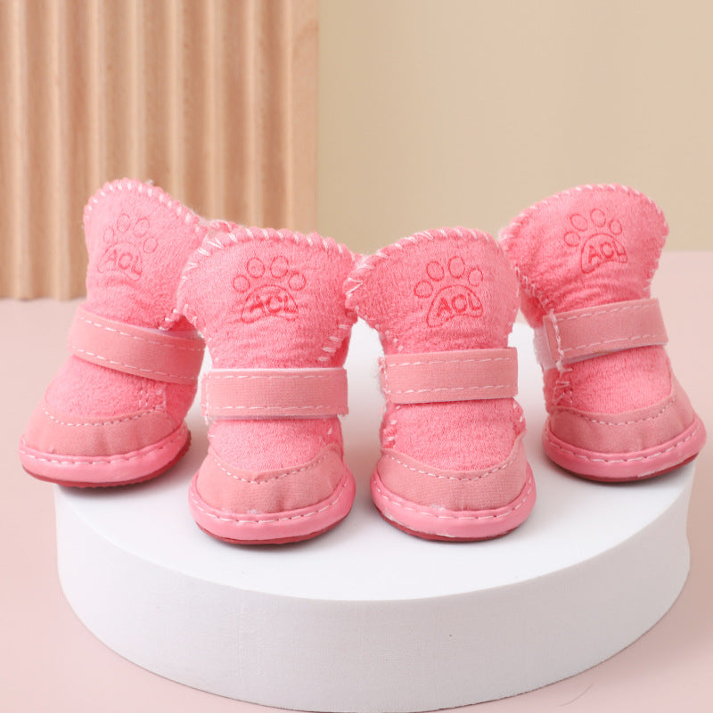 Warm cotton dog shoes with elastic cuffs for small dogs, in a home setting