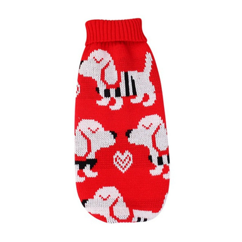 Small dog in a red reindeer knitted Christmas jumper