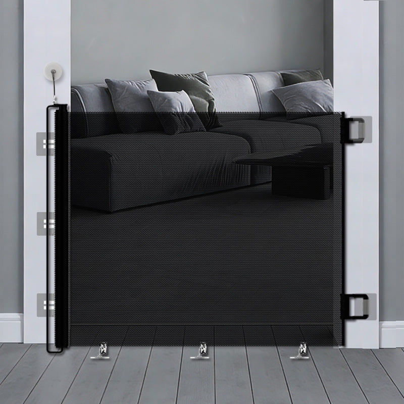 Retractable fabric pet gate across a doorway, photo 2 of 15