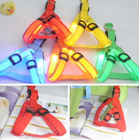 Rechargeable LED light up dog harness in Orange, showing size and shape