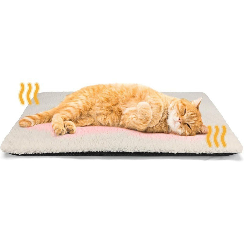 Dog resting on a white thick pet bed mat outdoors